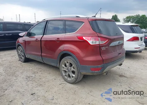 2014 Ford Escape Titanium z USA, uszkodzony, nr VIN 1FMCU0JX1EUB33892